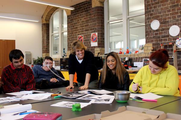 A group of disabled young people in a study room