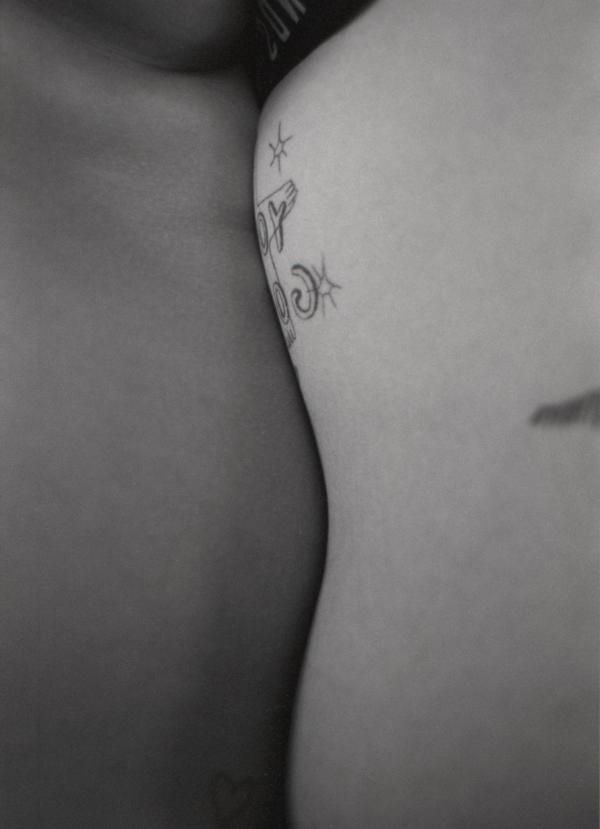 Extreme close up of two body parts very close to each other